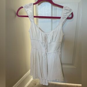 Super cute white romper size medium only worn once!